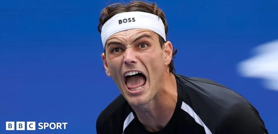 Tennis player celebrating during a match
