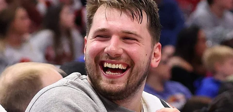 Player laughing on the bench during a game