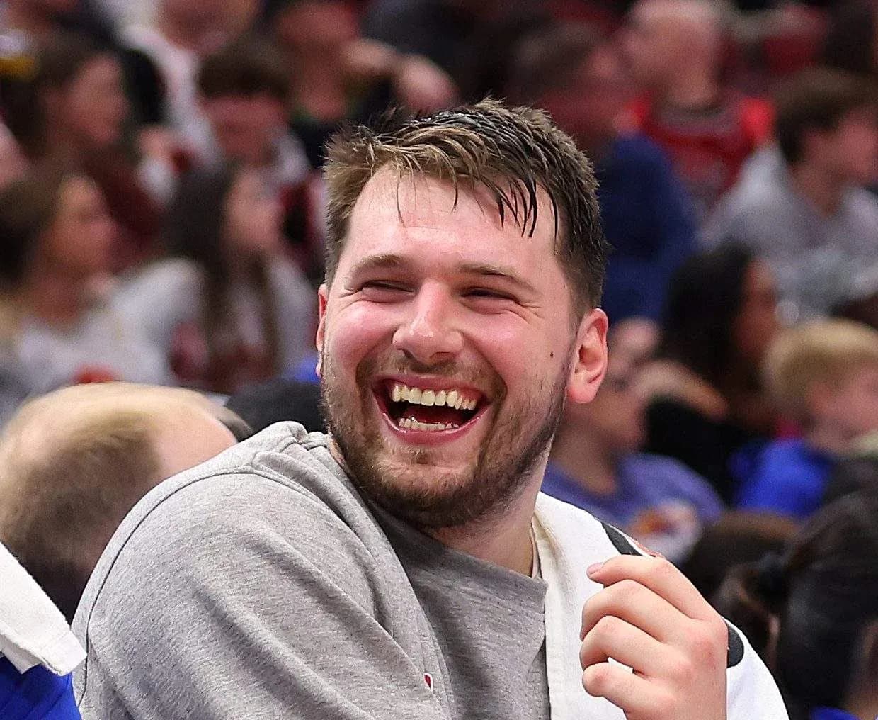 Player laughing on the bench during a game
