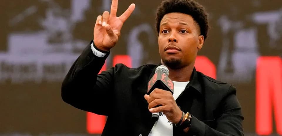 Player gesturing peace sign during press conference