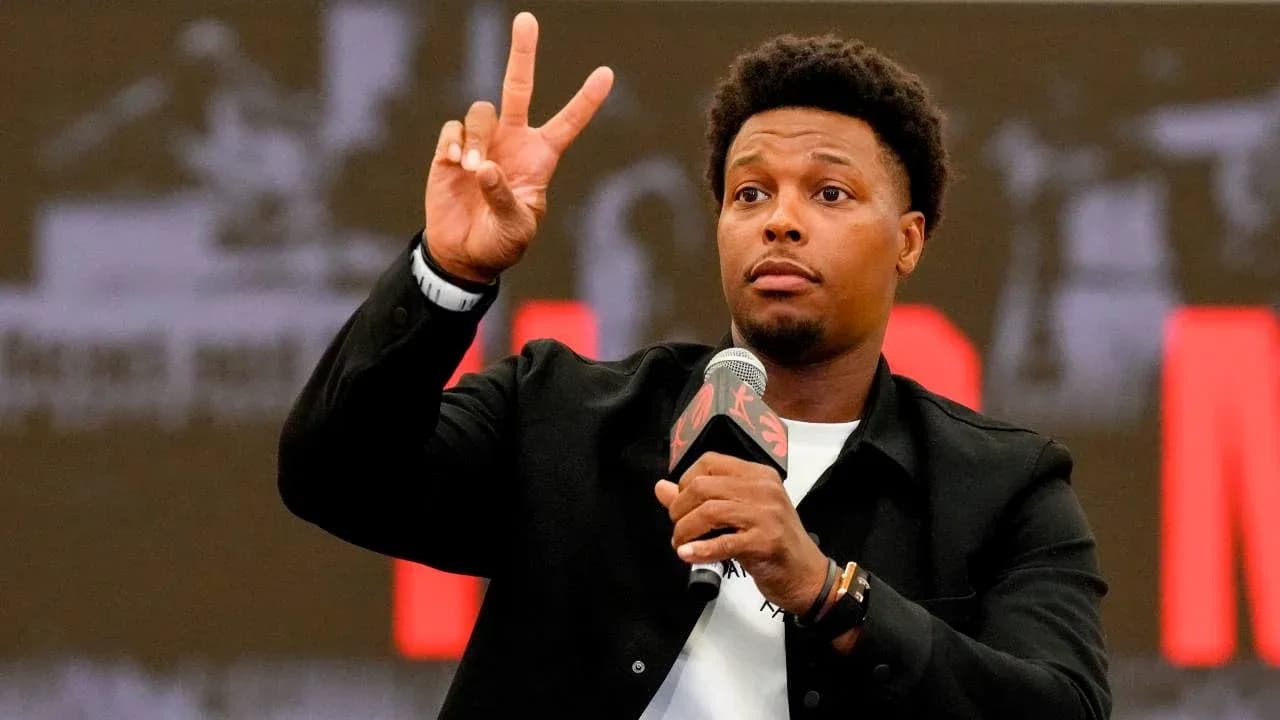 Player gesturing peace sign during press conference
