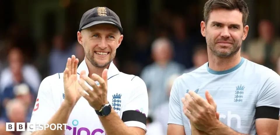 Two cricketers applauding during a match ceremony