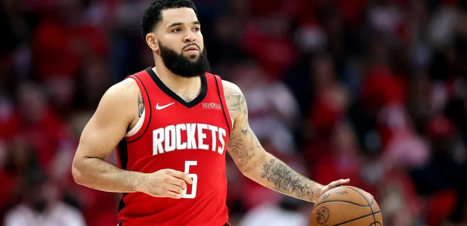 Player dribbling basketball in red Rockets jersey