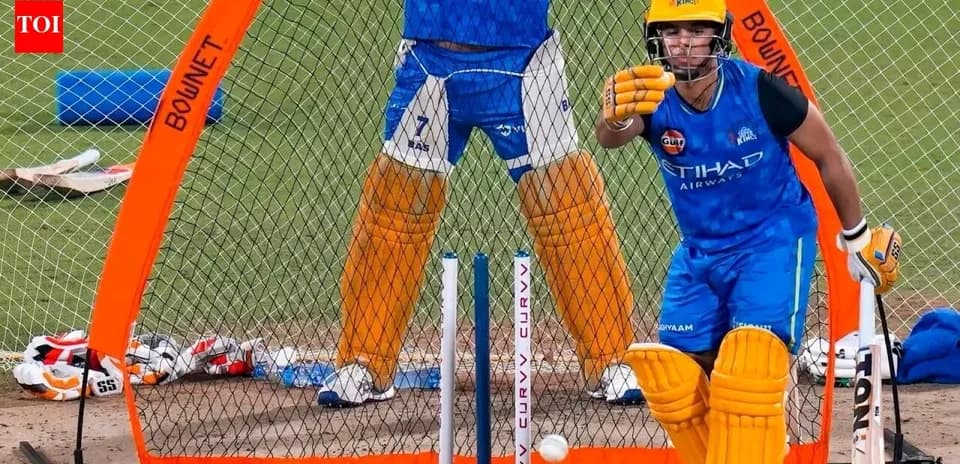 Batsman practicing in nets during cricket training session