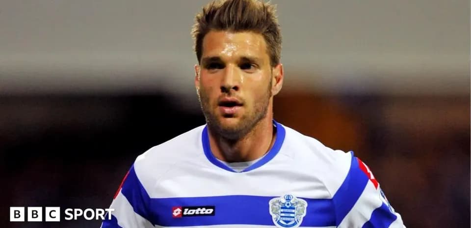 Player in QPR kit during match action