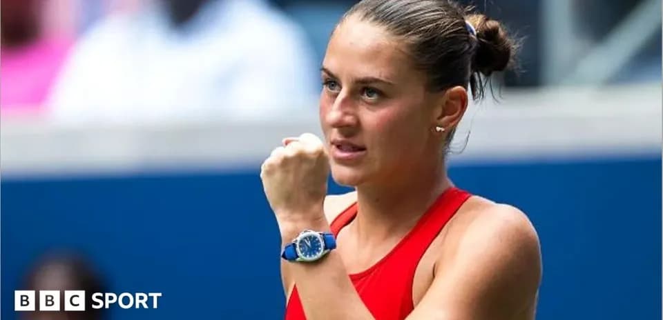 Tennis player celebrating during match at tournament