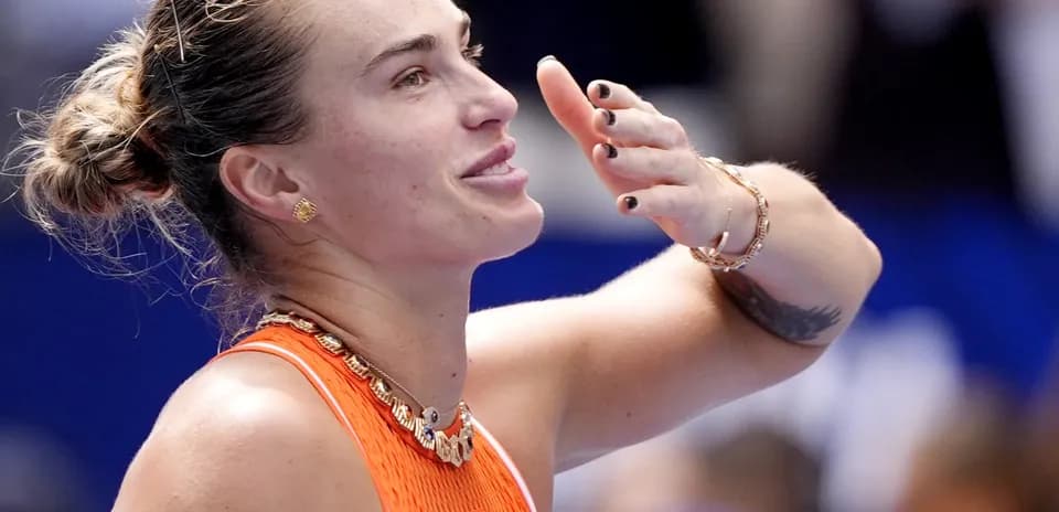 Player celebrating after winning a tennis match