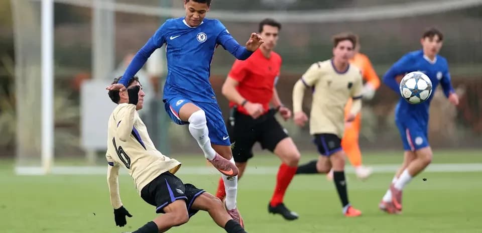 Player in blue jumping over opponent on ground
