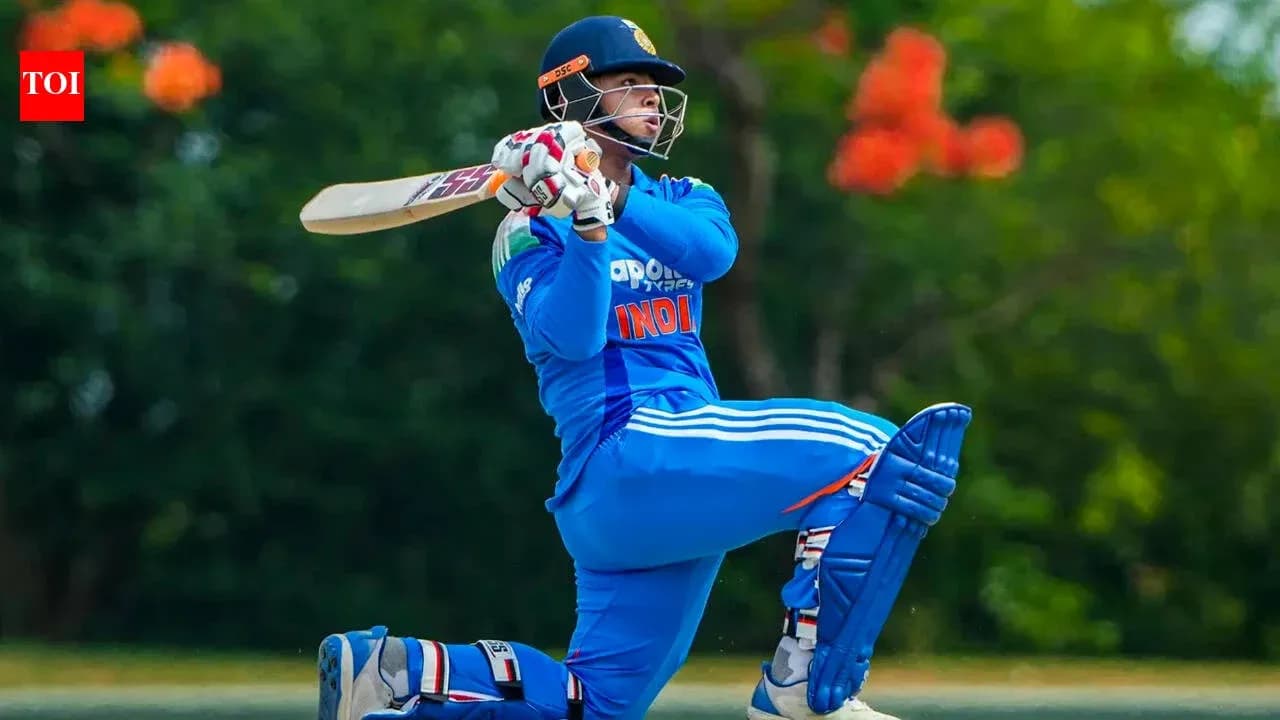 Batter playing a shot during cricket match