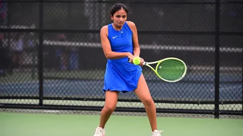 Tennis player preparing to hit a forehand shot