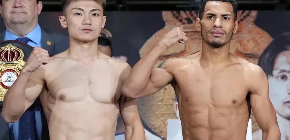 Two boxers posing during weigh-in event