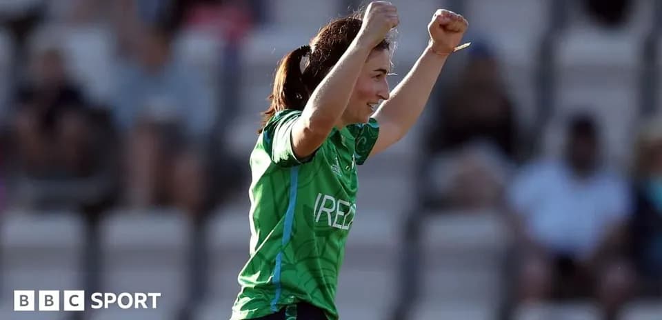 Player celebrating victory with raised arms