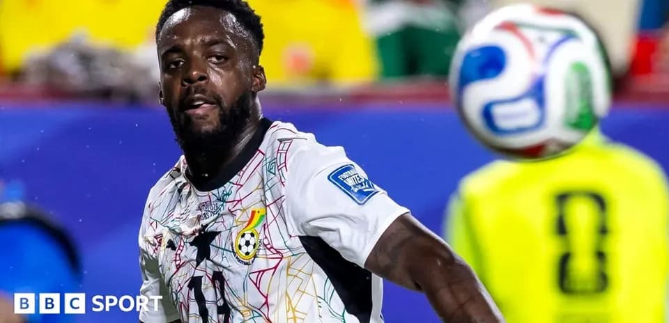 Ghanaian player preparing to pass the ball