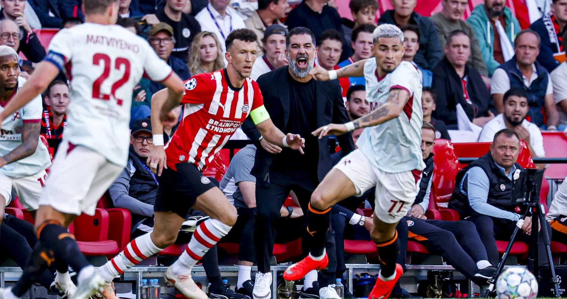 Players in action during a competitive football match