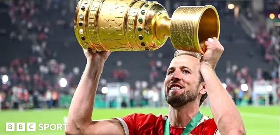 Player lifting trophy after winning the match