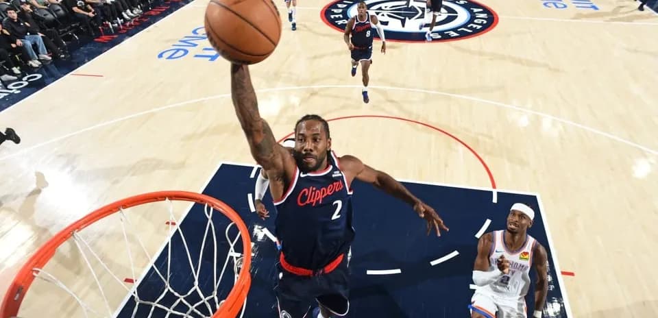 Player dunking during a basketball game action