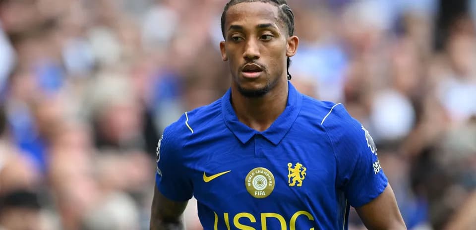 Player wearing Chelsea jersey on the field