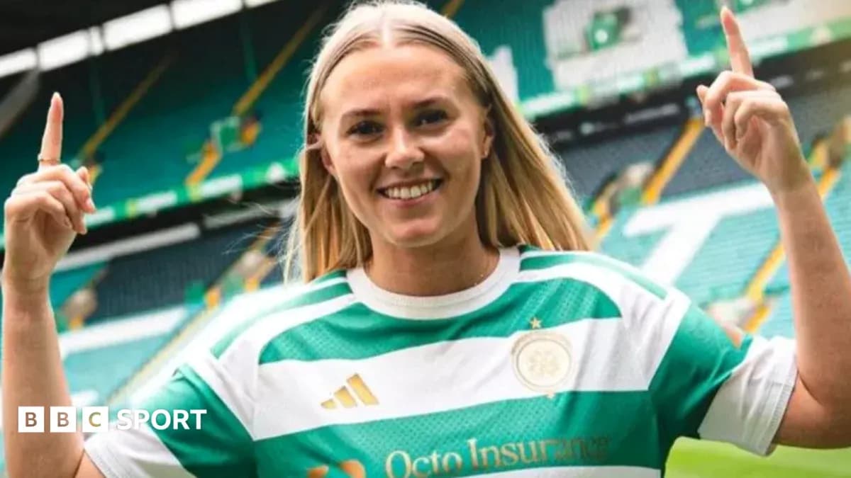 Player celebrating in Celtic FC jersey at stadium Player celebrating in Celtic FC jersey at stadium