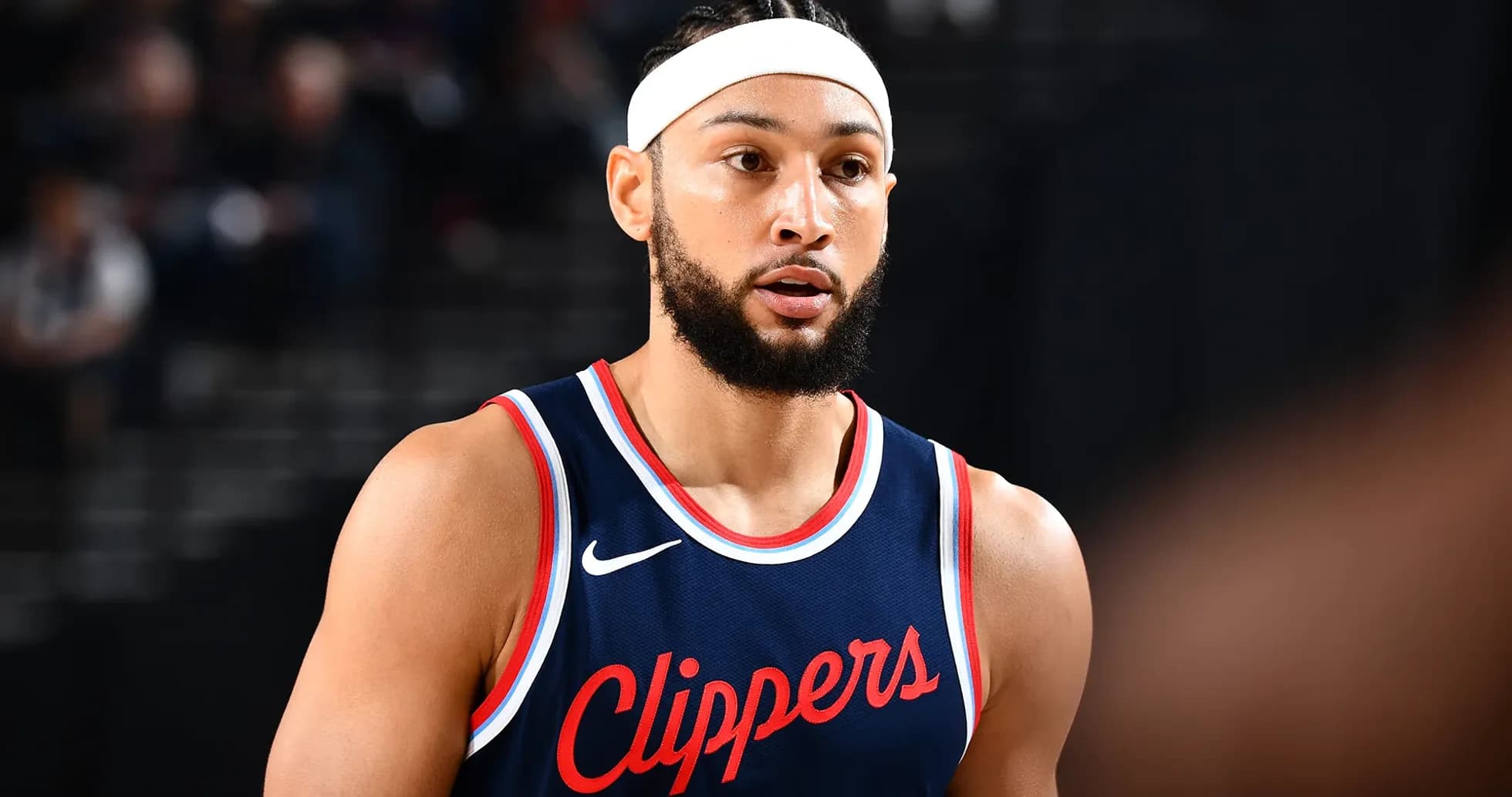 Player in Clippers jersey during game action Player in Clippers jersey during game action