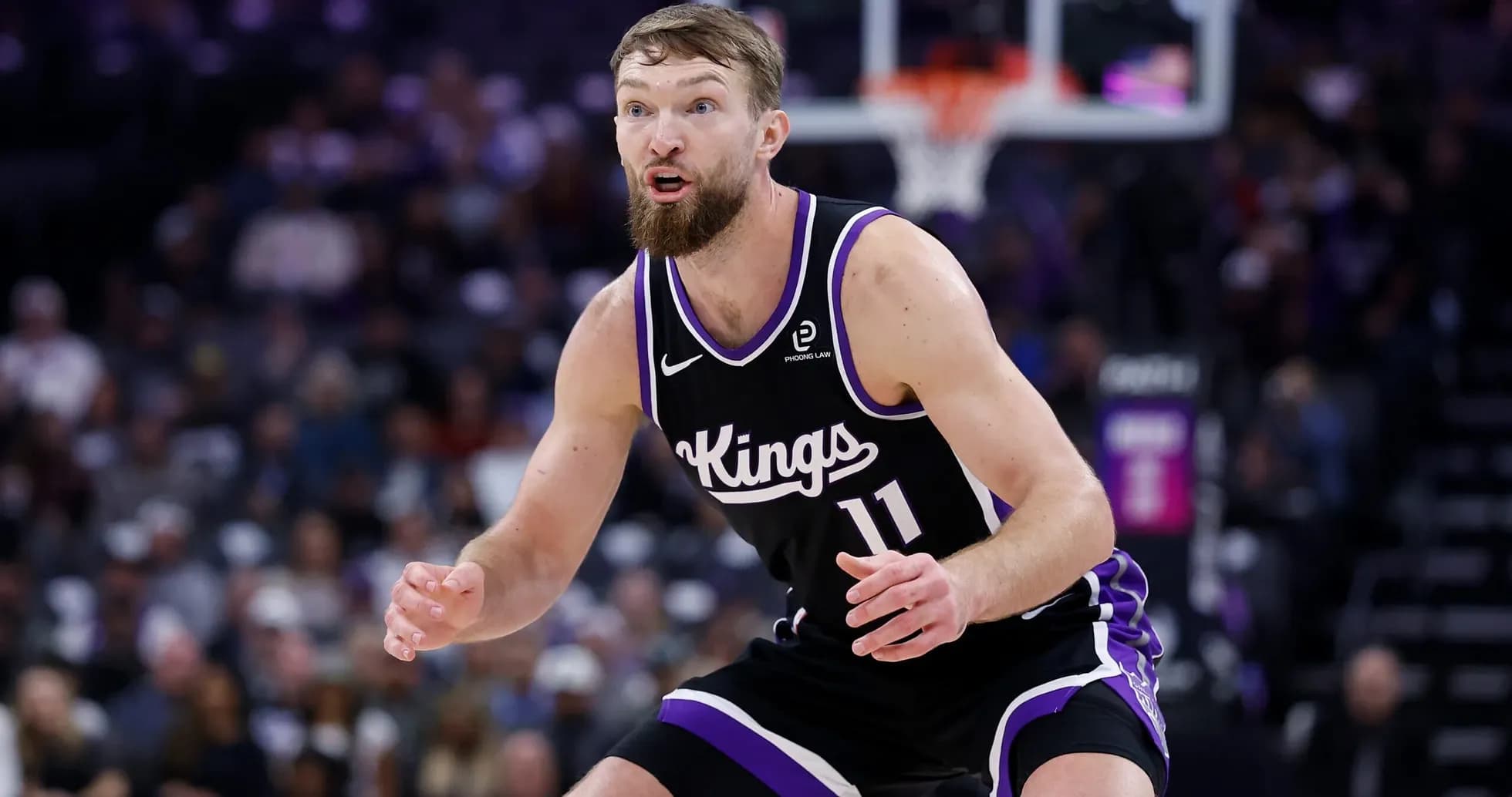 Player defending during a basketball game for Kings Player defending during a basketball game for Kings