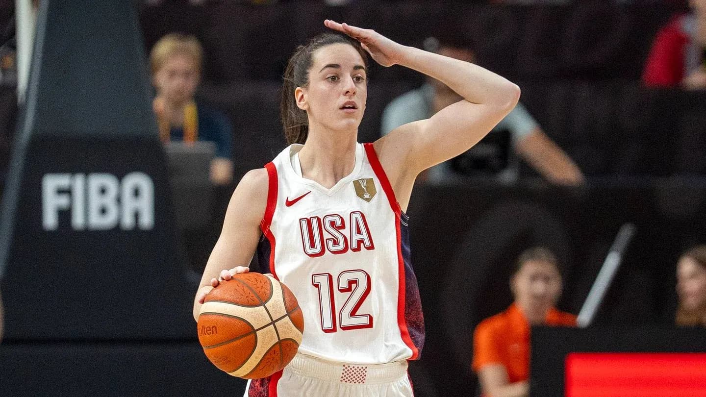 Player from USA team holding basketball during game Player from USA team holding basketball during game