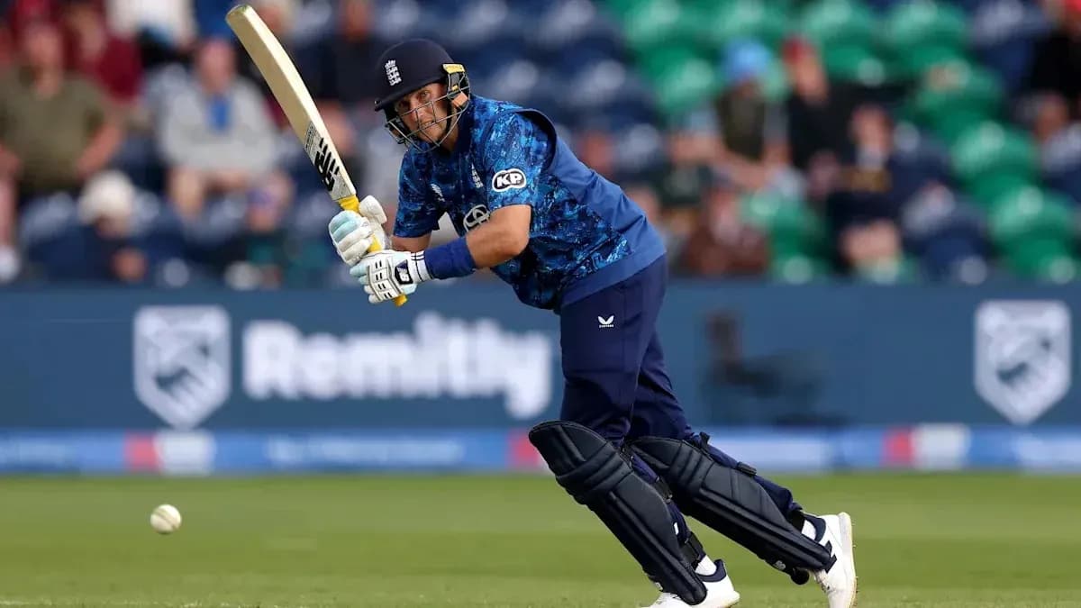 Batsman playing a shot during a cricket match Batsman playing a shot during a cricket match