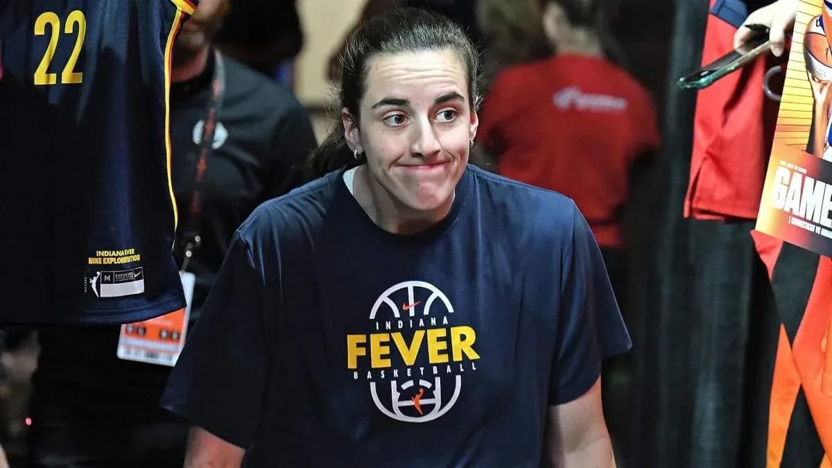 Player in Indiana Fever shirt walking towards court Player in Indiana Fever shirt walking towards court