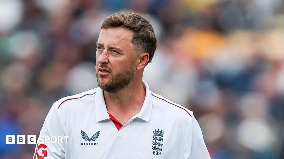 Cricketer in England kit during a match Cricketer in England kit during a match