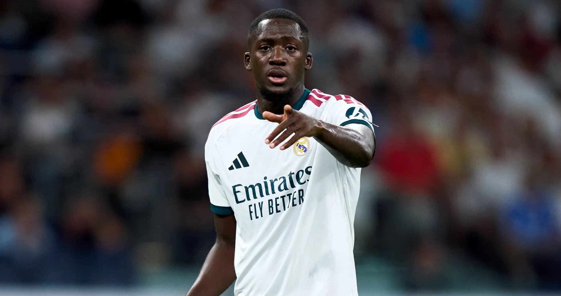 Player gesturing during match wearing Real Madrid jersey Player gesturing during match wearing Real Madrid jersey