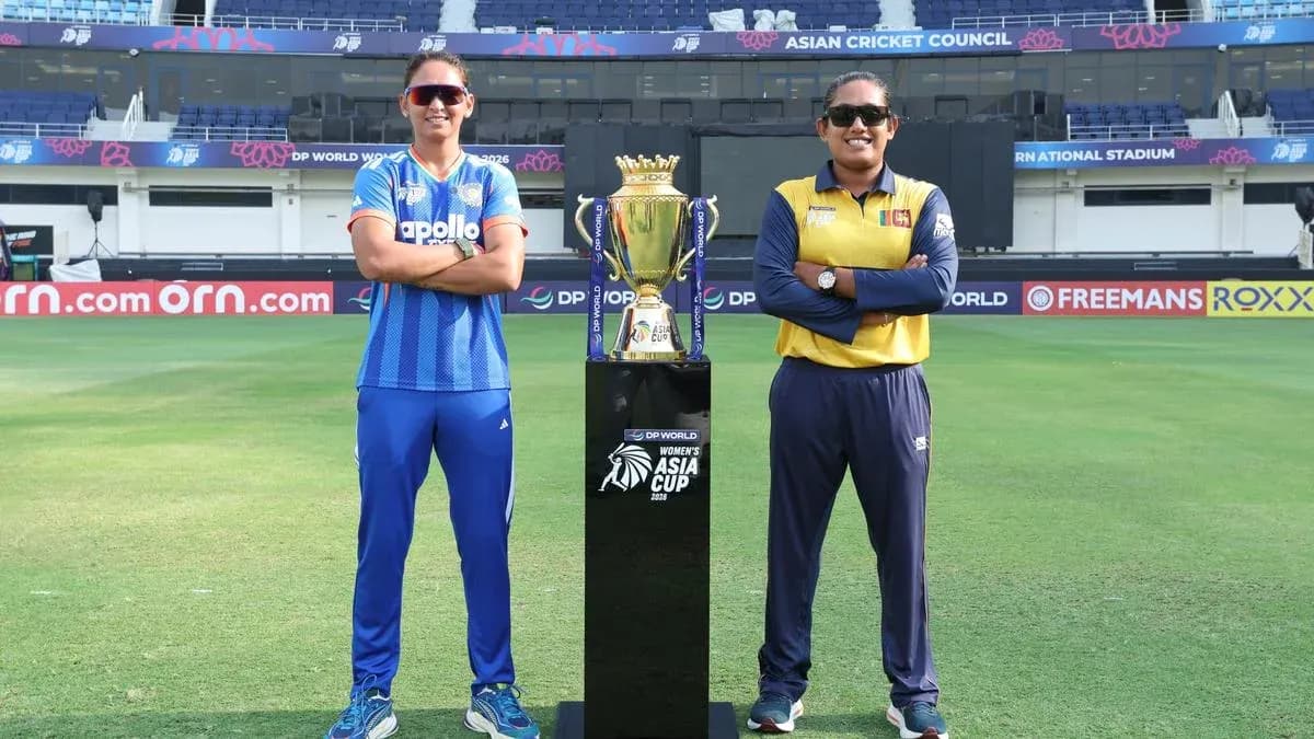Two captains posing with Women's Asia Cup trophy Two captains posing with Women's Asia Cup trophy