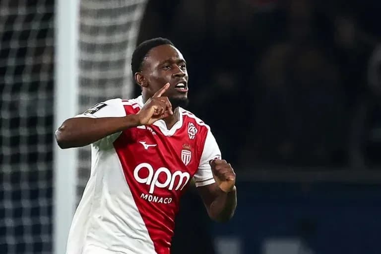 Player celebrating after scoring a goal for Monaco Player celebrating after scoring a goal for Monaco