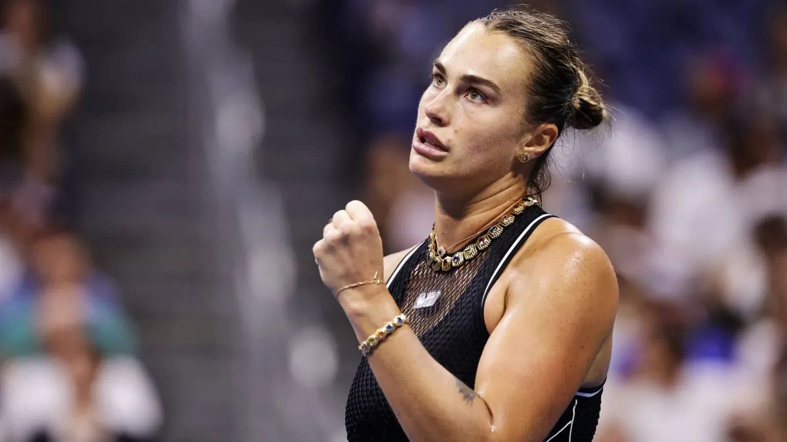 Tennis player celebrating a point during match Tennis player celebrating a point during match