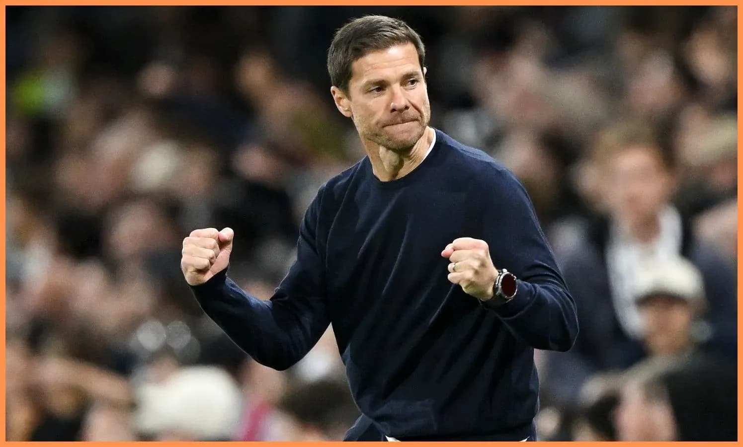 Coach celebrating a goal with clenched fists Coach celebrating a goal with clenched fists
