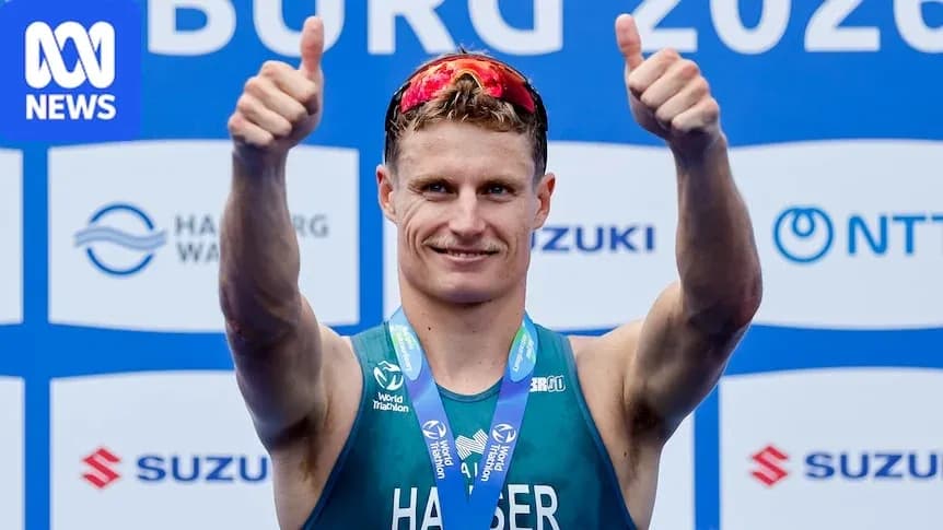 Athlete celebrating with thumbs up after event Athlete celebrating with thumbs up after event