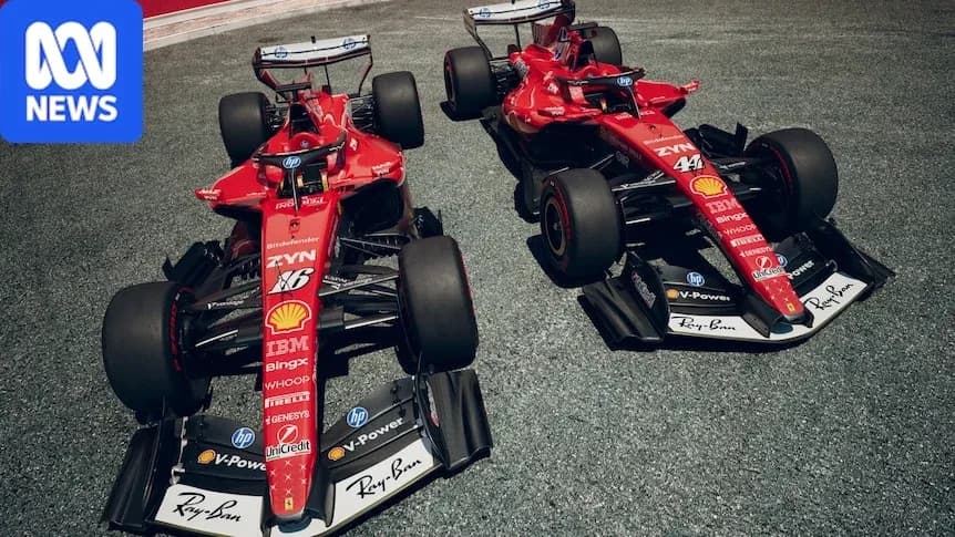 Two Ferrari Formula 1 cars on racetrack Two Ferrari Formula 1 cars on racetrack
