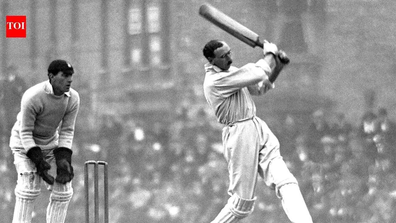 Batsman playing a shot with wicketkeeper behind Batsman playing a shot with wicketkeeper behind