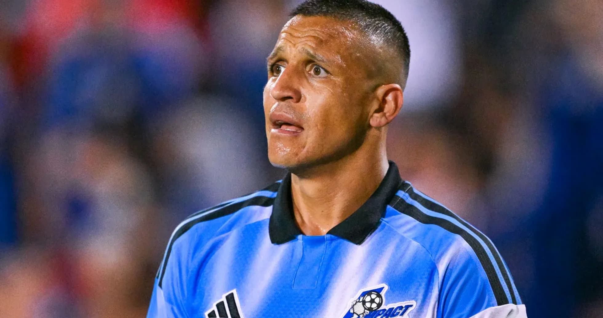 Referee in blue jersey during soccer match Referee in blue jersey during soccer match