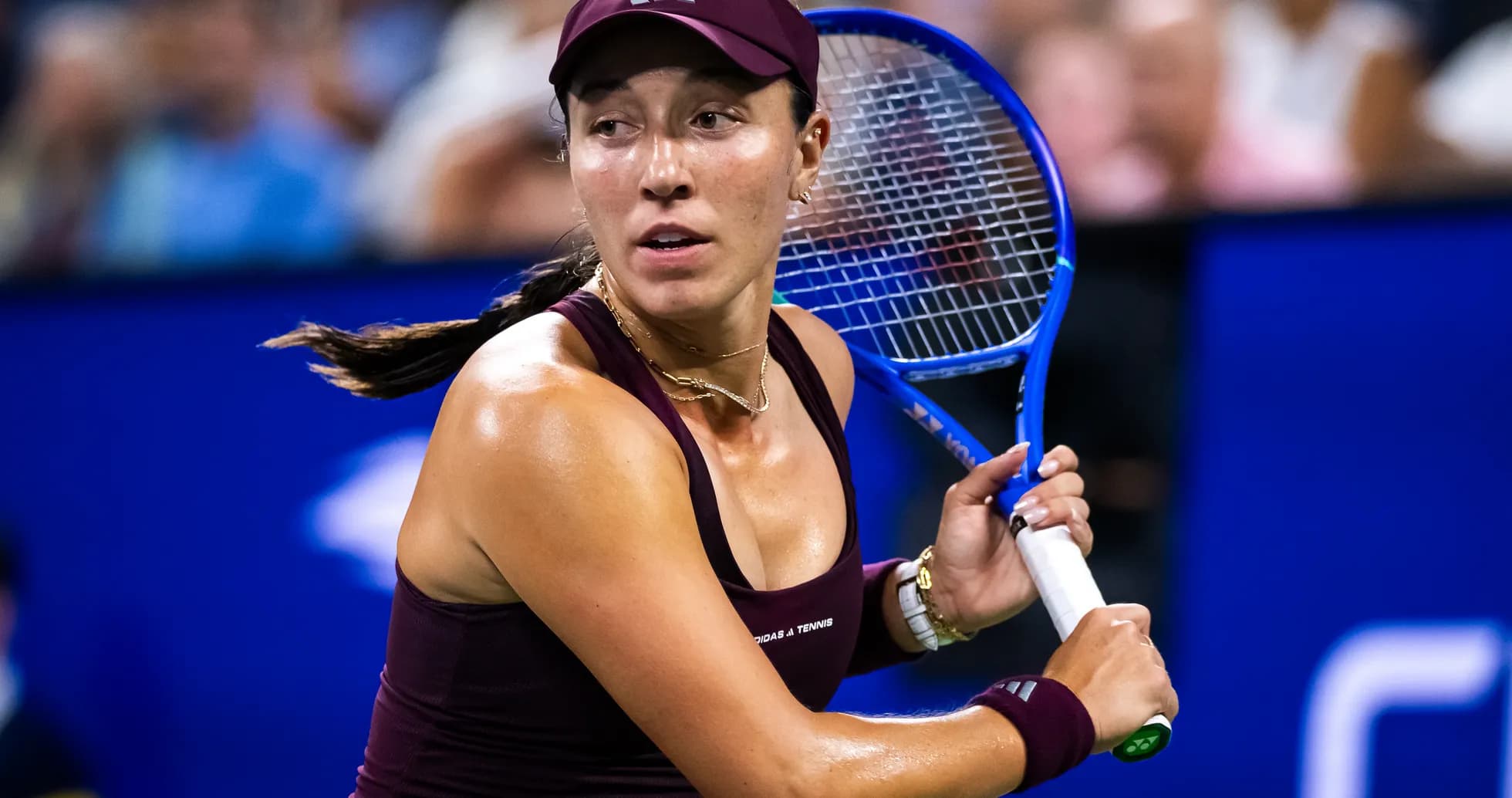 Female tennis player preparing to hit a shot Female tennis player preparing to hit a shot