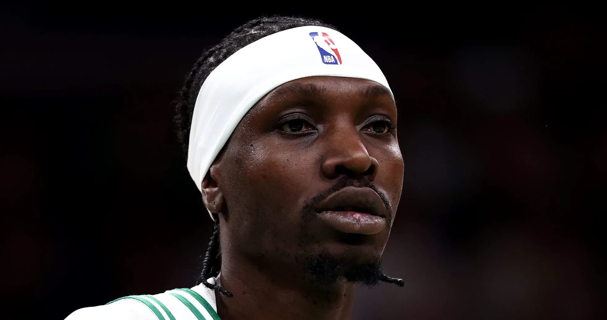 Basketball player wearing headband during game Basketball player wearing headband during game