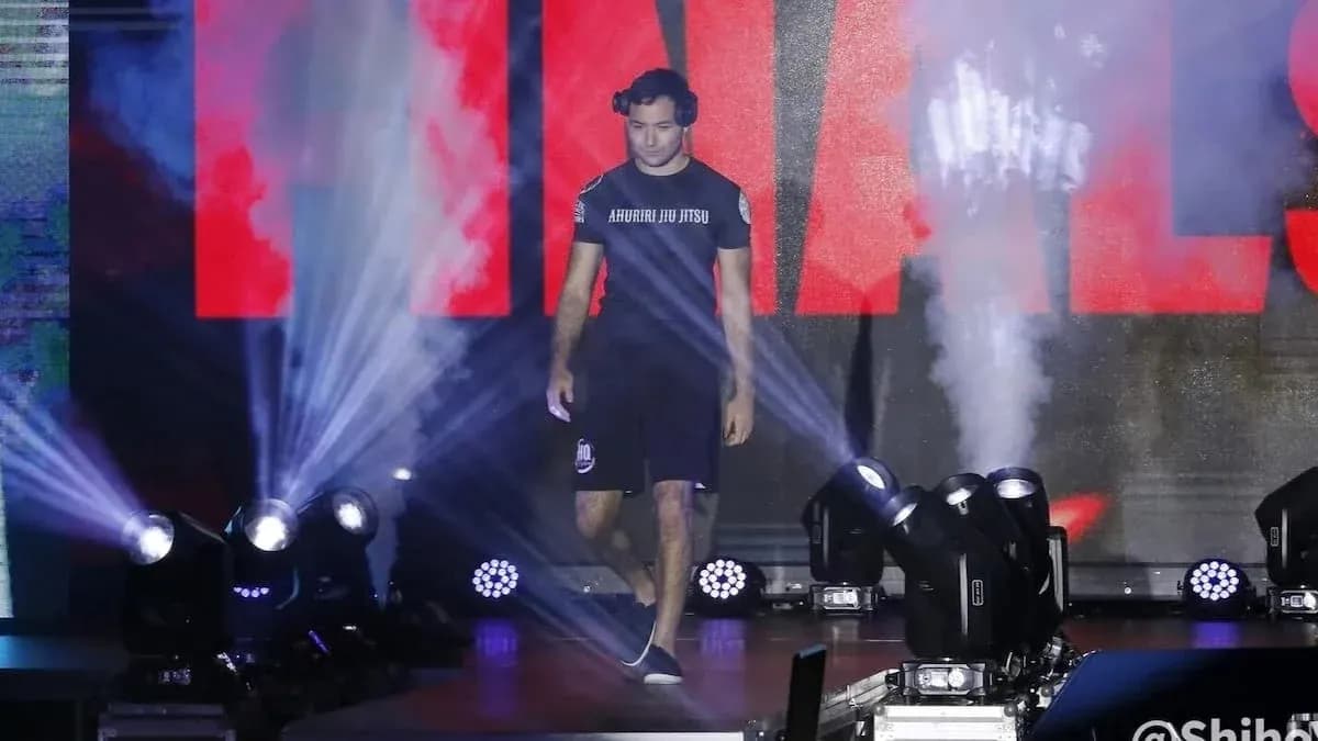 Athlete walking onto stage during finals event Athlete walking onto stage during finals event