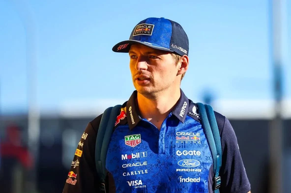Driver in team uniform walking with backpack Driver in team uniform walking with backpack