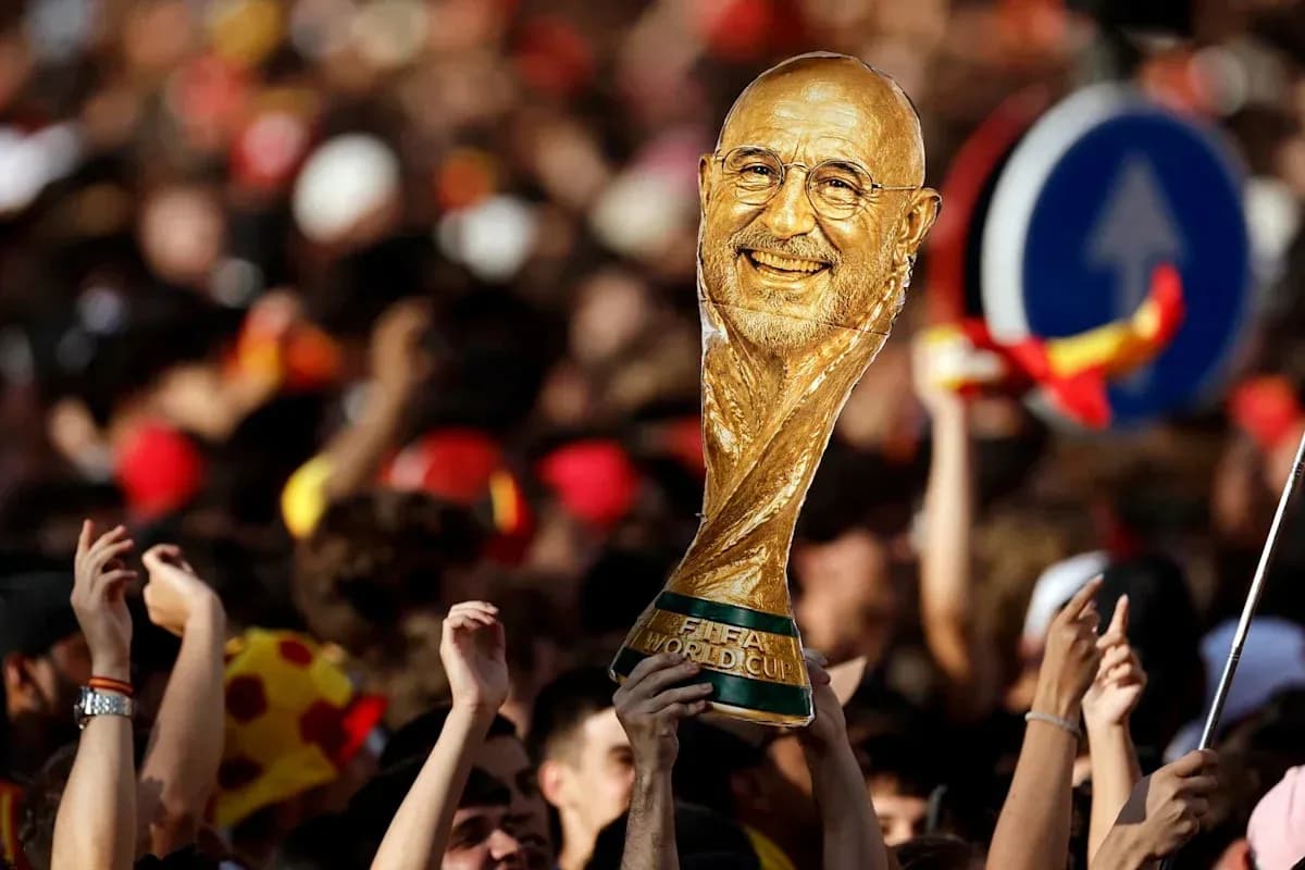 Fans celebrating with a FIFA World Cup trophy Fans celebrating with a FIFA World Cup trophy