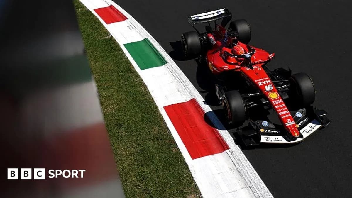 Ferrari car navigating a corner on racetrack Ferrari car navigating a corner on racetrack