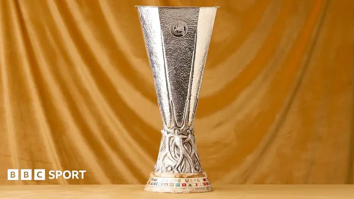 UEFA Europa League trophy displayed on a pedestal UEFA Europa League trophy displayed on a pedestal