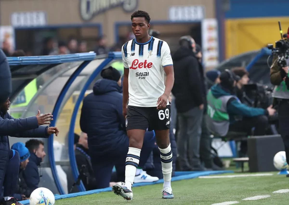 Player walking past bench during match substitution Player walking past bench during match substitution