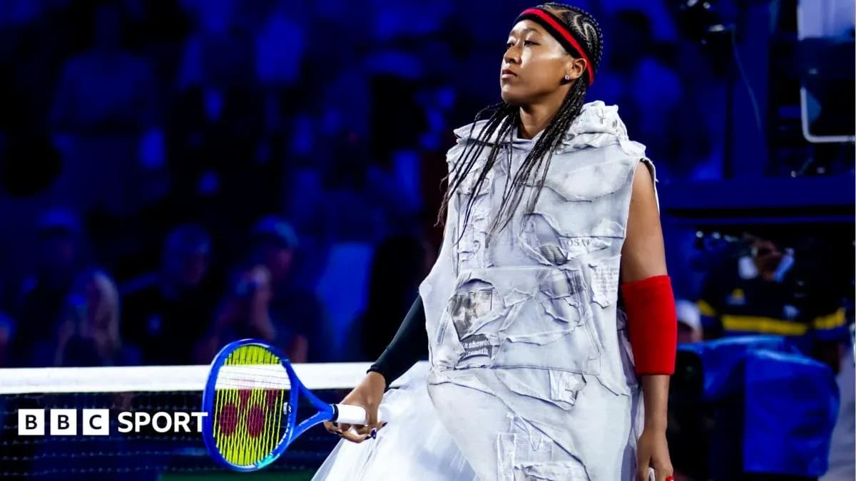 Naomi Osaka walking onto the court with racket Naomi Osaka walking onto the court with racket