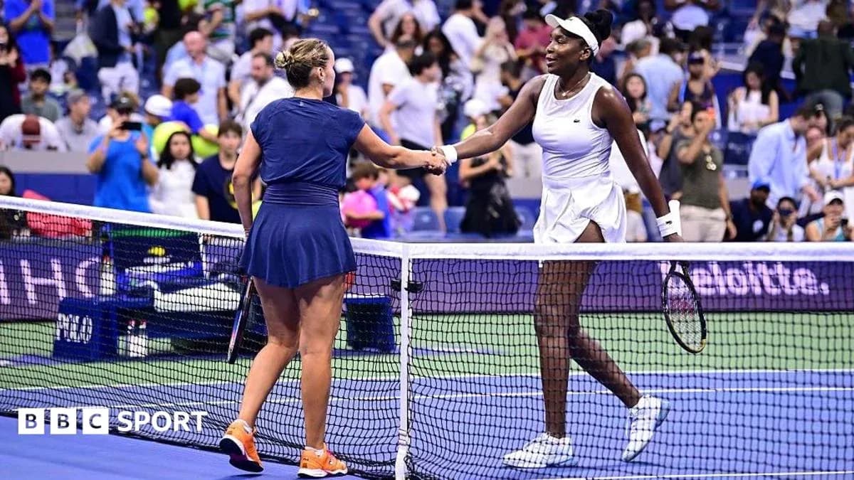 Players shaking hands at the net after match Players shaking hands at the net after match