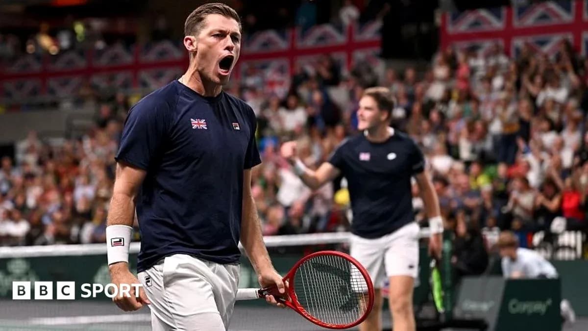 Player celebrating a point during a tennis match Player celebrating a point during a tennis match