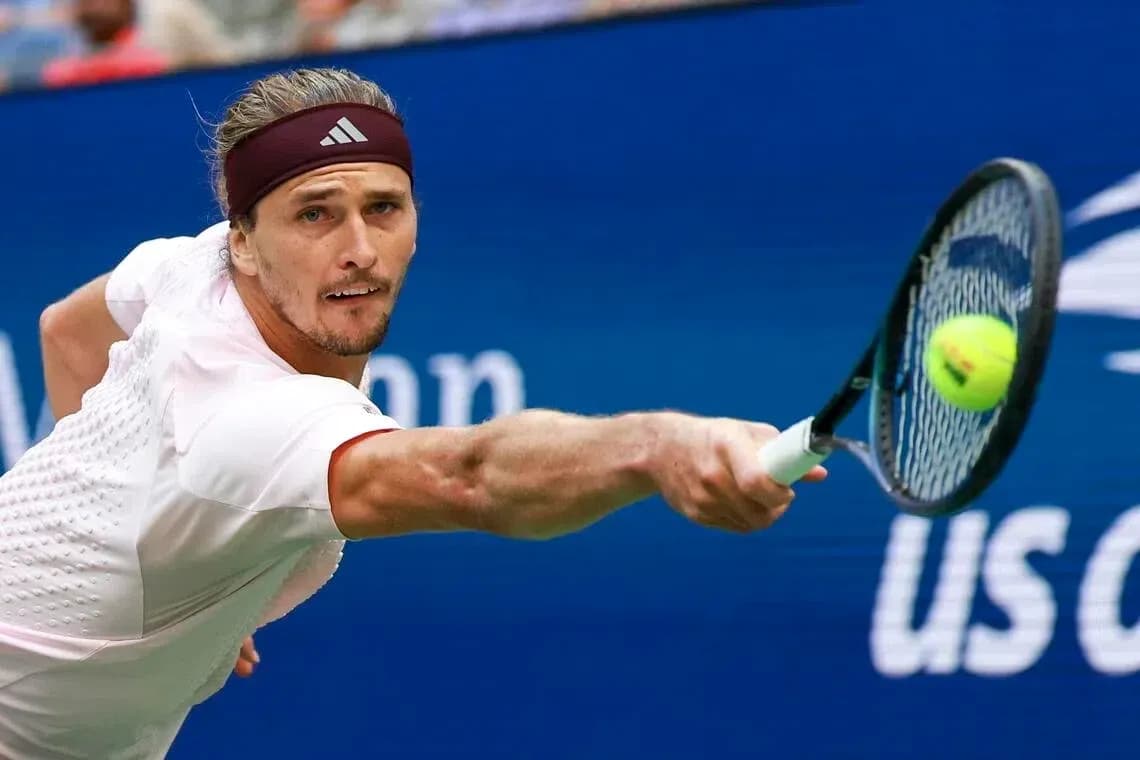 Player hitting a tennis ball during match Player hitting a tennis ball during match