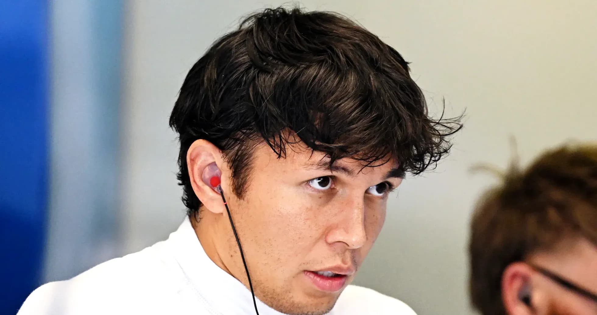 Driver listening intently during a team meeting Driver listening intently during a team meeting